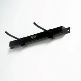Aeromat Workout Mat Adjustable Wall-Mounted Hanging Rack Mounted on a Wall, Showcasing its Durable Black Steel Construction and Ability to Store Up to 10 Fitness Mats Neatly and Efficiently