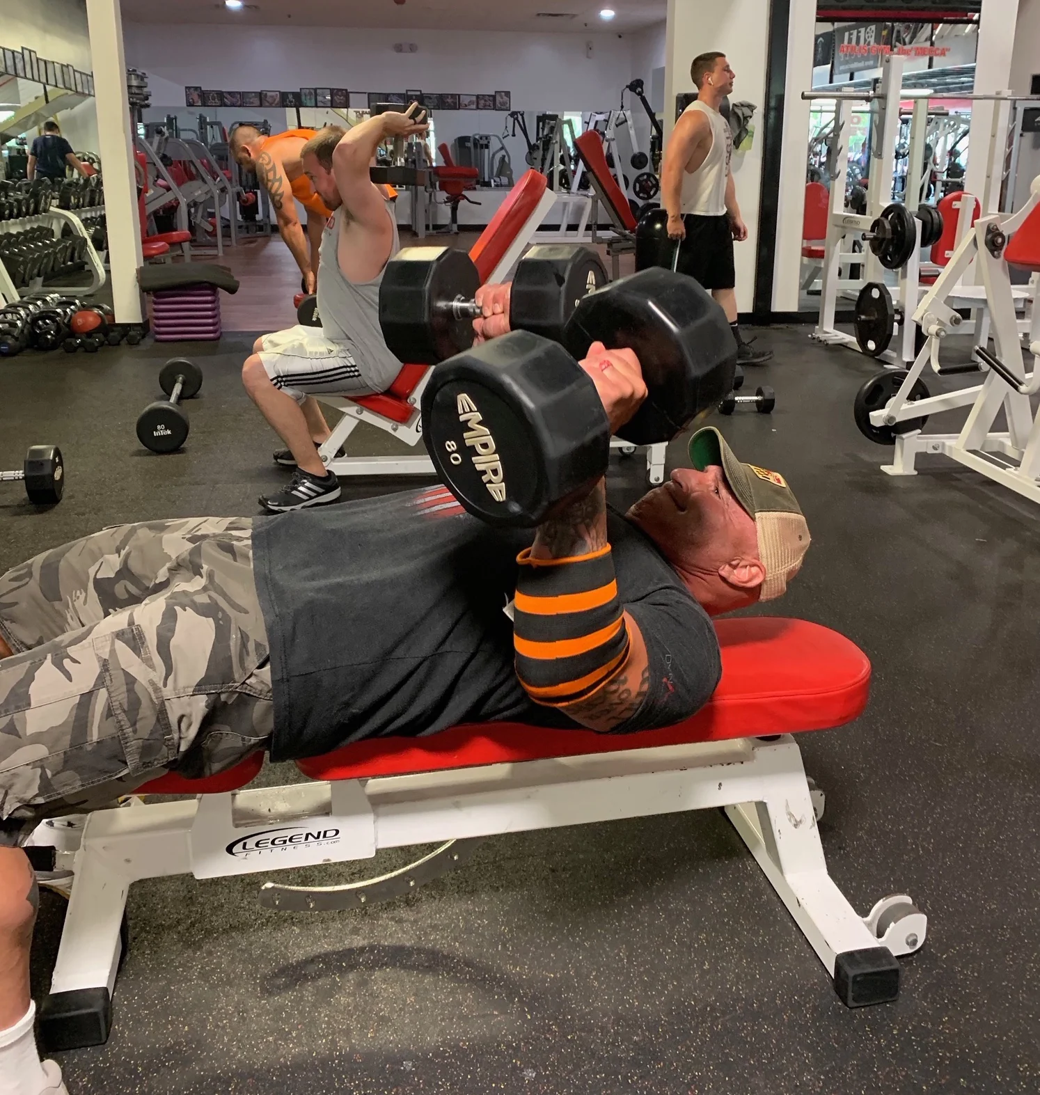 Athlete performing a dumbbell bench press