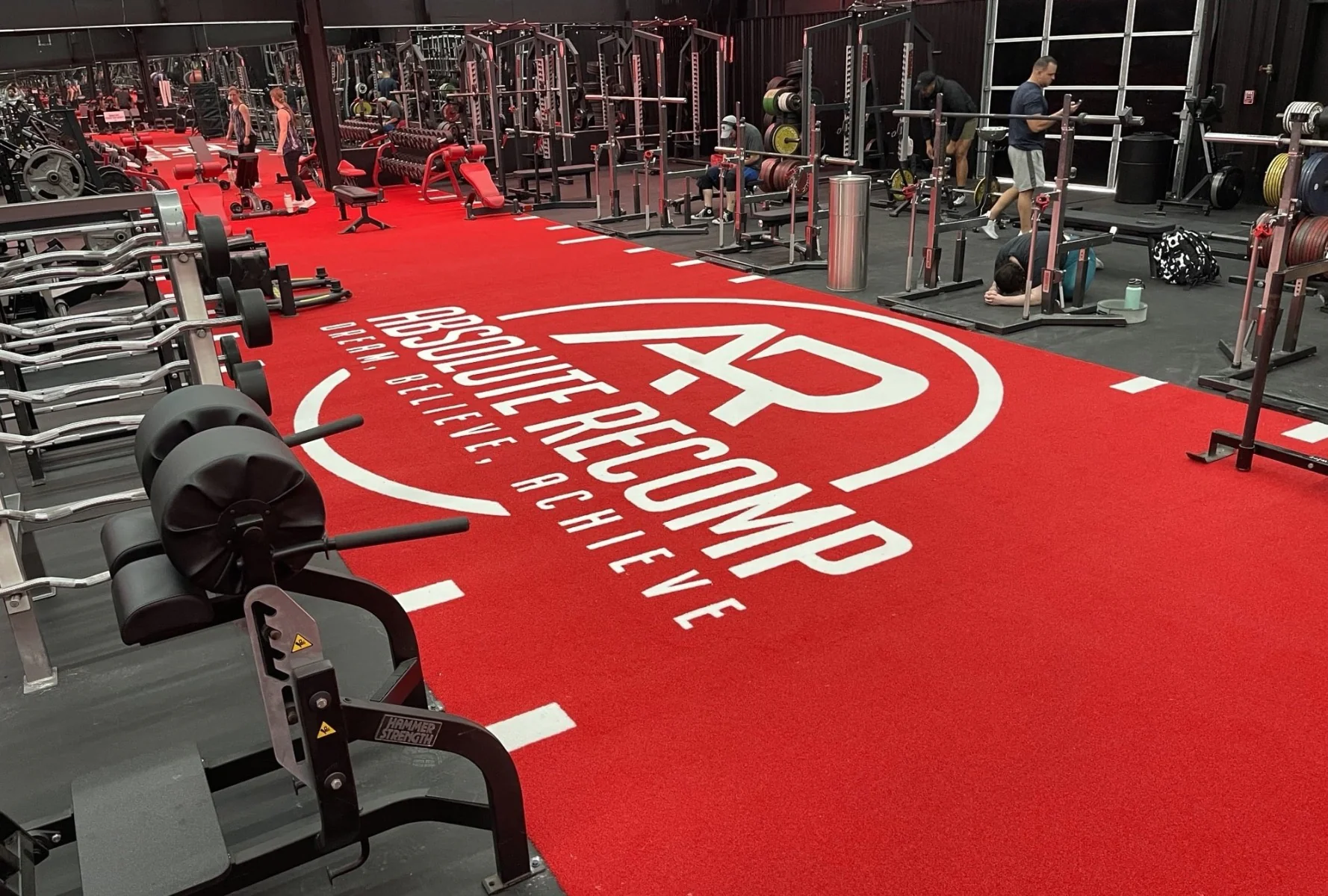 Custom Indoor and Outdoor Artificial Turf Installation with logo available at IRON COMPANY for residential, commercial, and GSA contract customers.