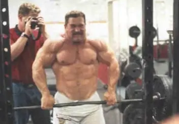 Kirk Karwoski performing barbell shrugs