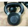 IRON COMPANY Premium Cast Iron Kettlebells with Matte Black Powder Coat Finish, color coded handles and large numbers for easy identification.