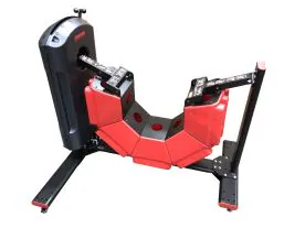 Red Functional Tire Trainer (FTT) by Marpo Kinetics, a Commercial-Grade Tire Flipping Machine with Adjustable Magnetic Resistance for Strength Training