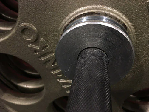 Close-up of Olympic bar collar and sleeve