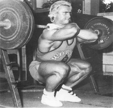 Tom Platz performing a deep front barbell squat