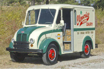 Old dairy delivery truck representing whole milk strength nutrition