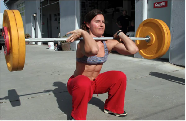 Athlete performing a deep front barbell squat