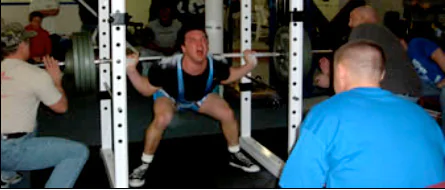 Improper Olympic Barbell Squatting Technique in Squat Cage