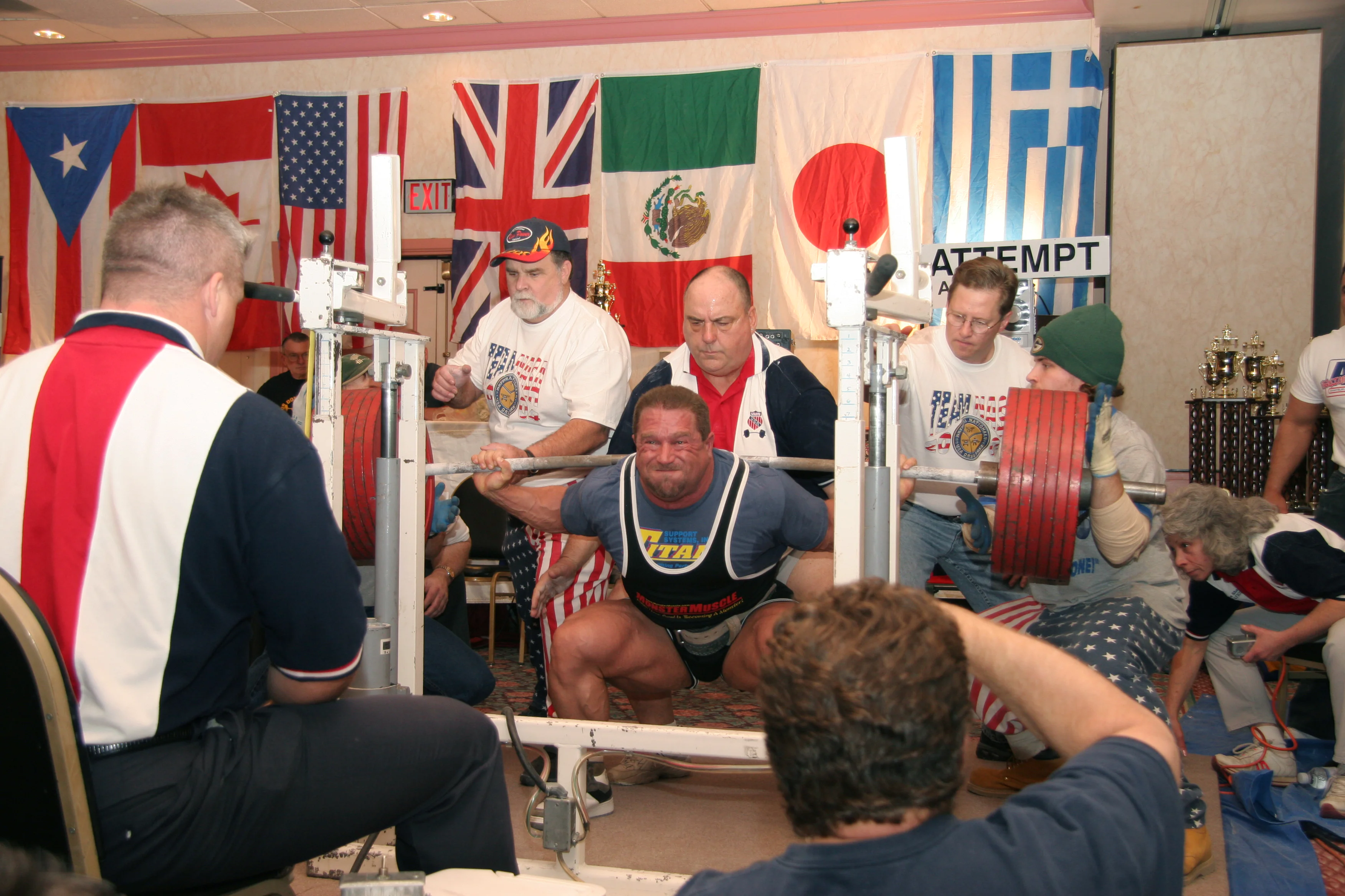 Athlete performing a barbell squat to demonstrate strength