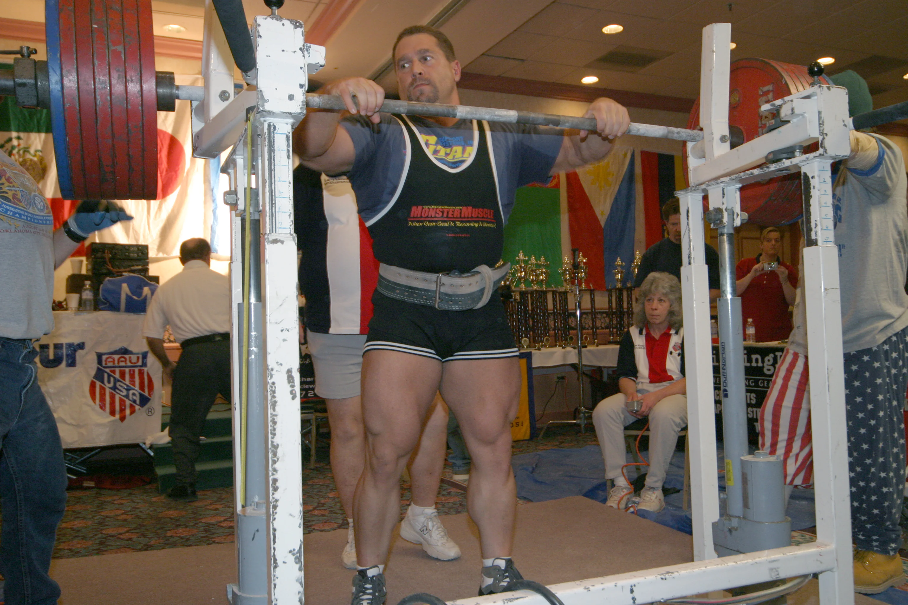 Kirk Karwoski preparing to perform a heavy barbell squat