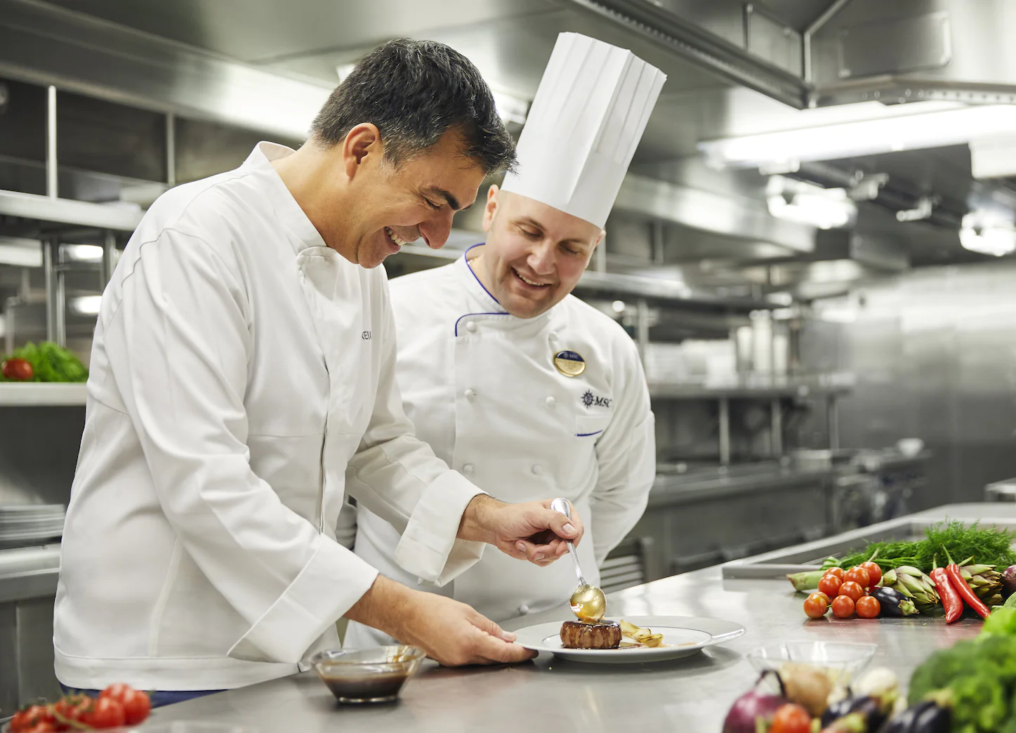 Chefs preparing fresh food in a professional kitchen
