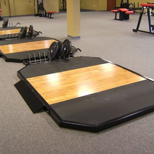 Hardwood weightlifting platform with rubber landing areas