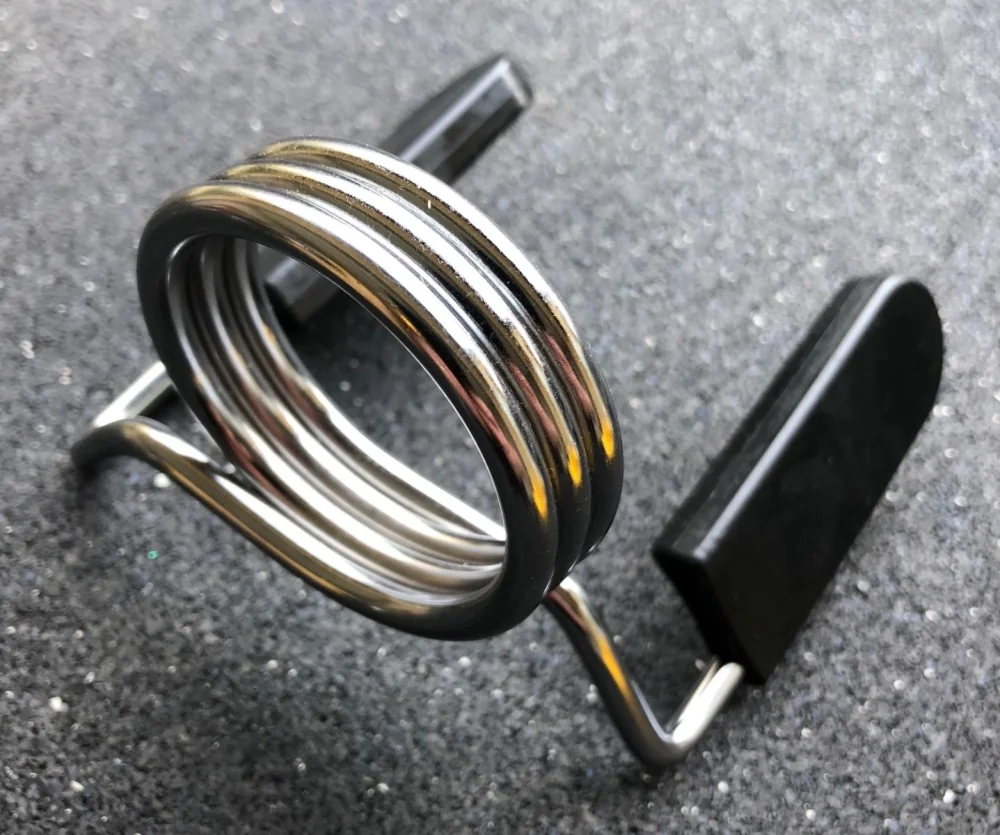 Olympic barbell spring collar for securing weight plates