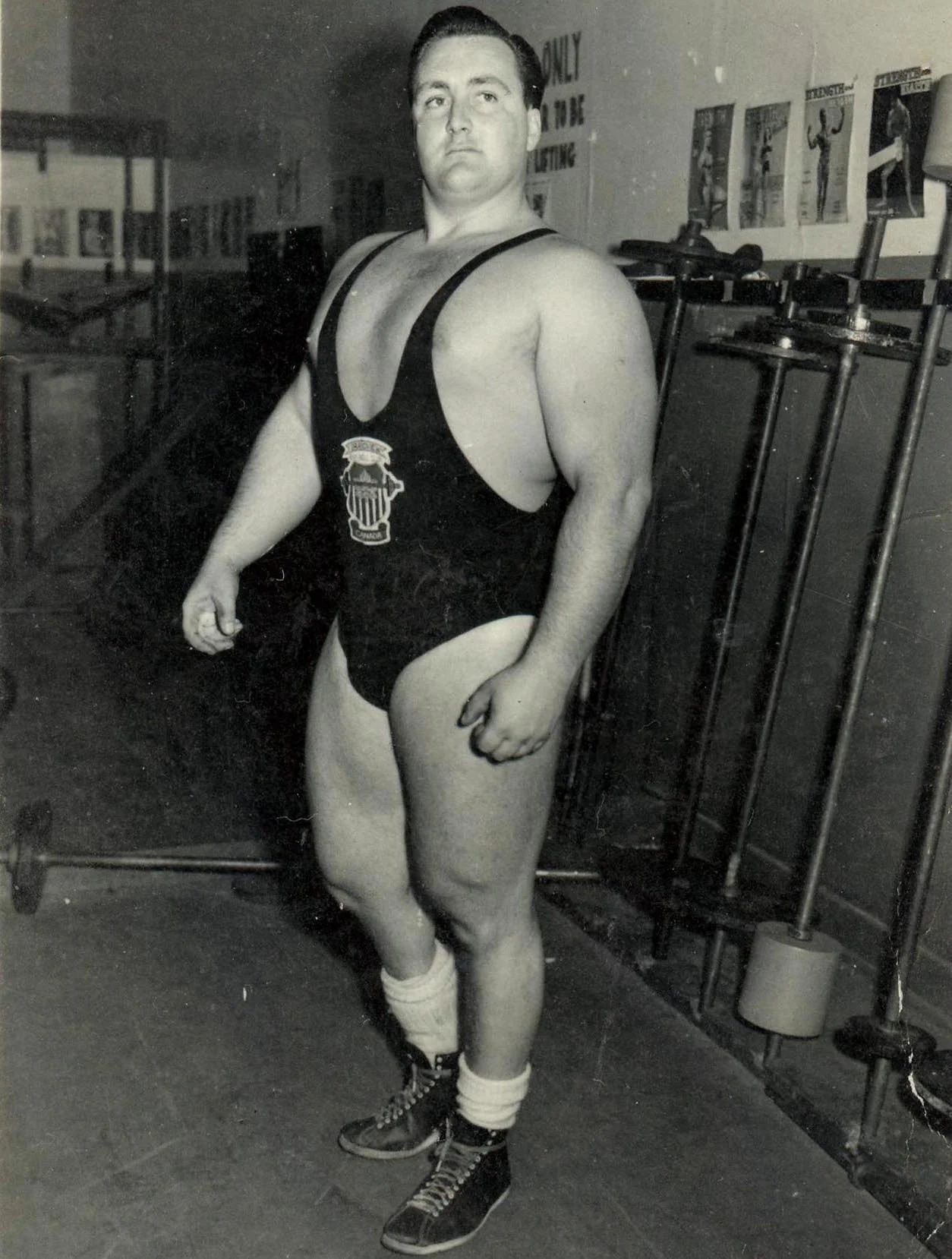Doug Hepburn showing his physique as a strength giant