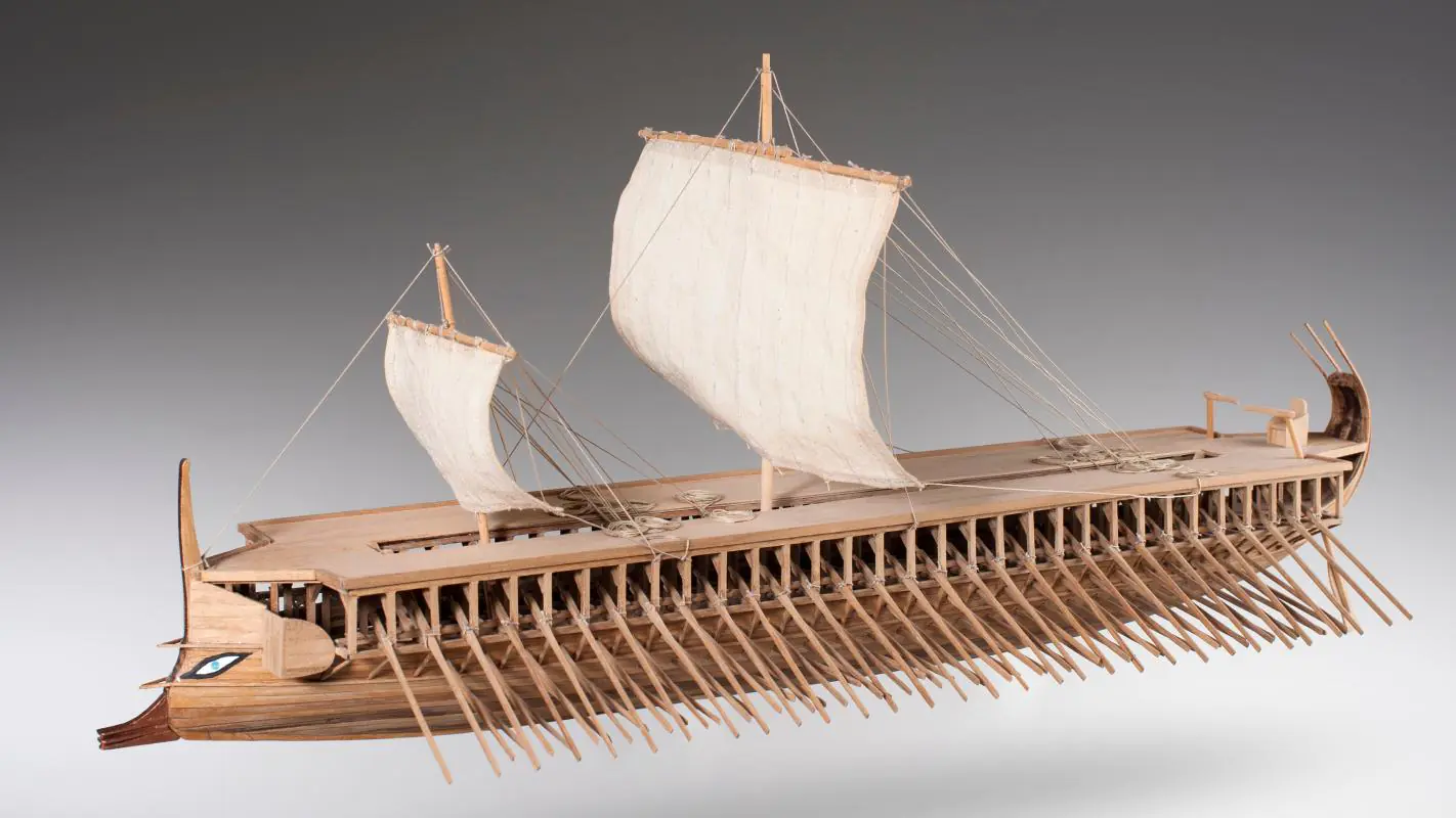 Greek-style rowing boat with oars for primal periodization
