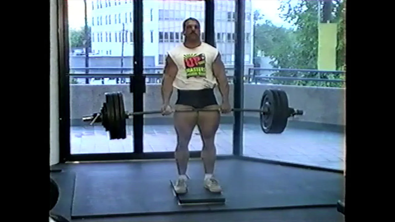Kirk Karwoski performing a heavy barbell deadlift