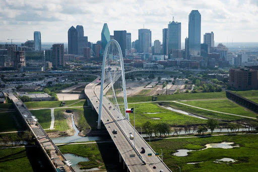 Dallas skyline representing IRON COMPANY gym equipment warehouse pick-up in Farmers Branch, TX