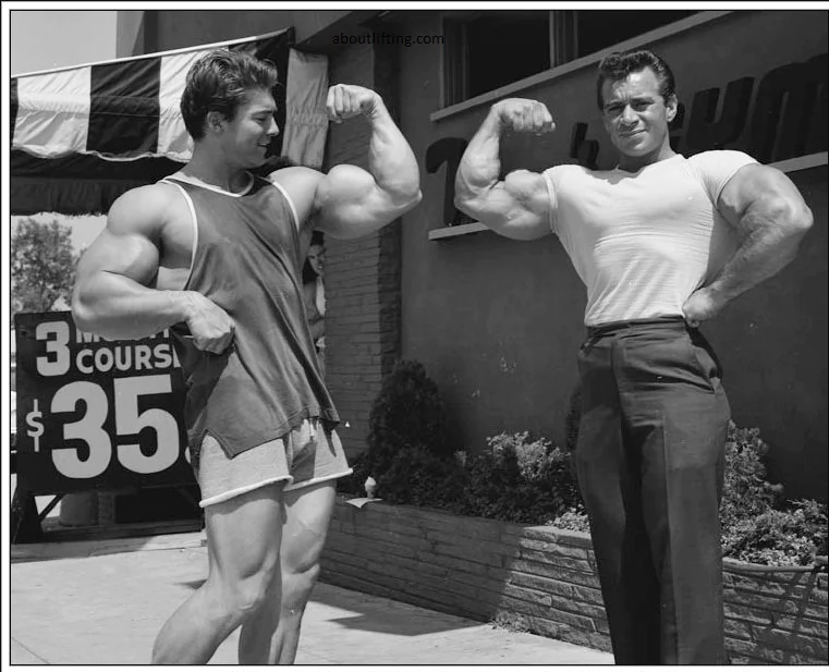 Freddy Ortiz and Larry Scott posing outside Vince Gironda’s Hollywood Gym in 1964