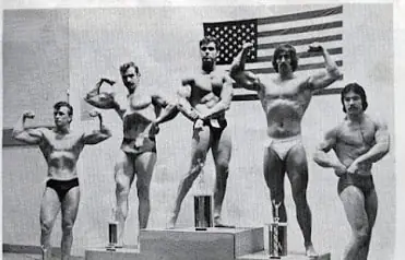 Hugh Cassidy standing with other strength athletes