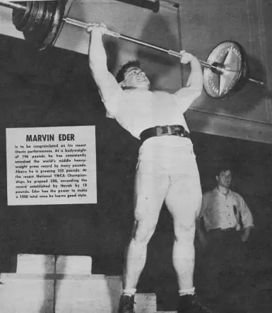 Marvin Eder performing a clean and overhead press