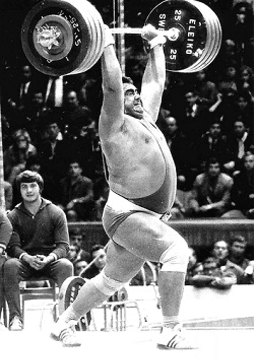 Vasily Alexeev performing a clean and jerk