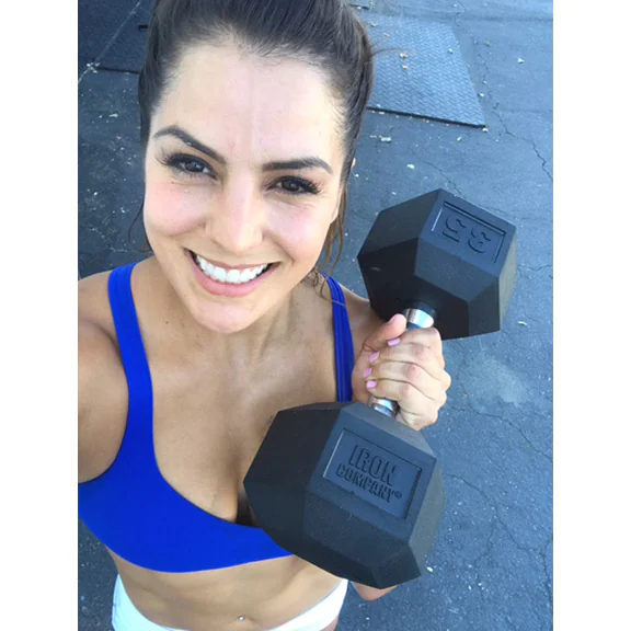 IRON COMPANY and Crossfit athlete Jackie Perez using rubber hex dumbbells in her WOD.