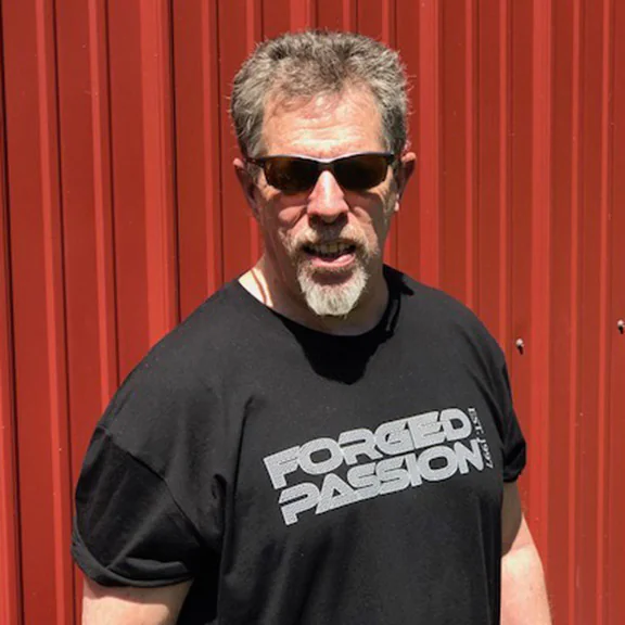 IRON COMPANY athlete Marty Gallagher wearing his Forged Passion shirt.