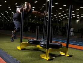 RageTurf Rally Interlocking Turf Tiles | Ecore (RAGETURF-RALLY-TILE) for sled training in cross-training facilities and sports performance facilities. Shown with optional interlocking reducer transition edge. 