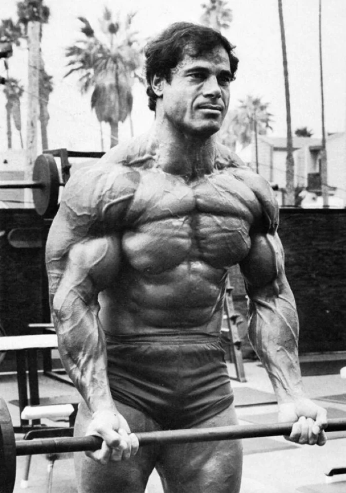 Franco Columbu posing with a muscular bodybuilding physique