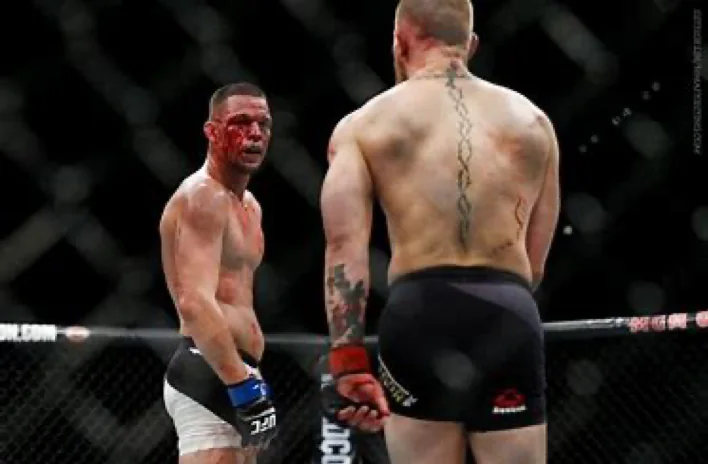 Two MMA fighters facing off inside the Octagon